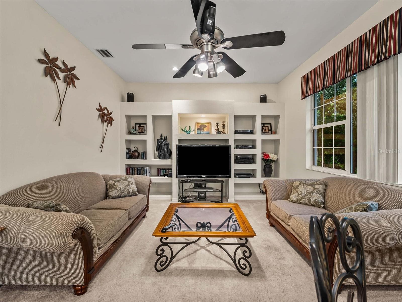 FamilyRoom_9336StPaulDr_PortCharlotte_BuiltInEntertainment_Wide.jpg - 9336 ST PAUL DR, PORT CHARLOTTE