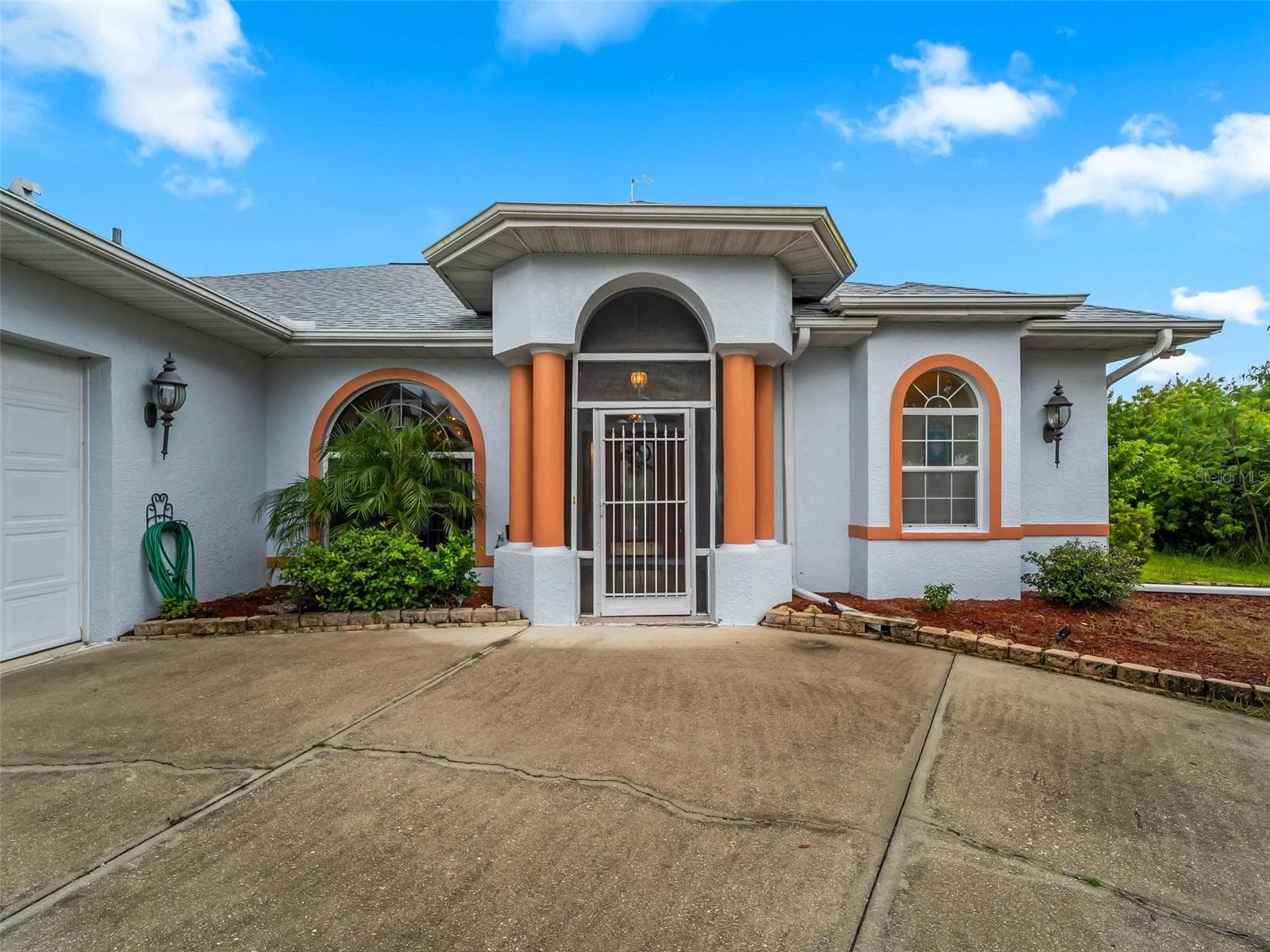 FrontExterior_9336StPaulDr_PortCharlotte_ArchedEntry_Wide.jpg - 9336 ST PAUL DR, PORT CHARLOTTE