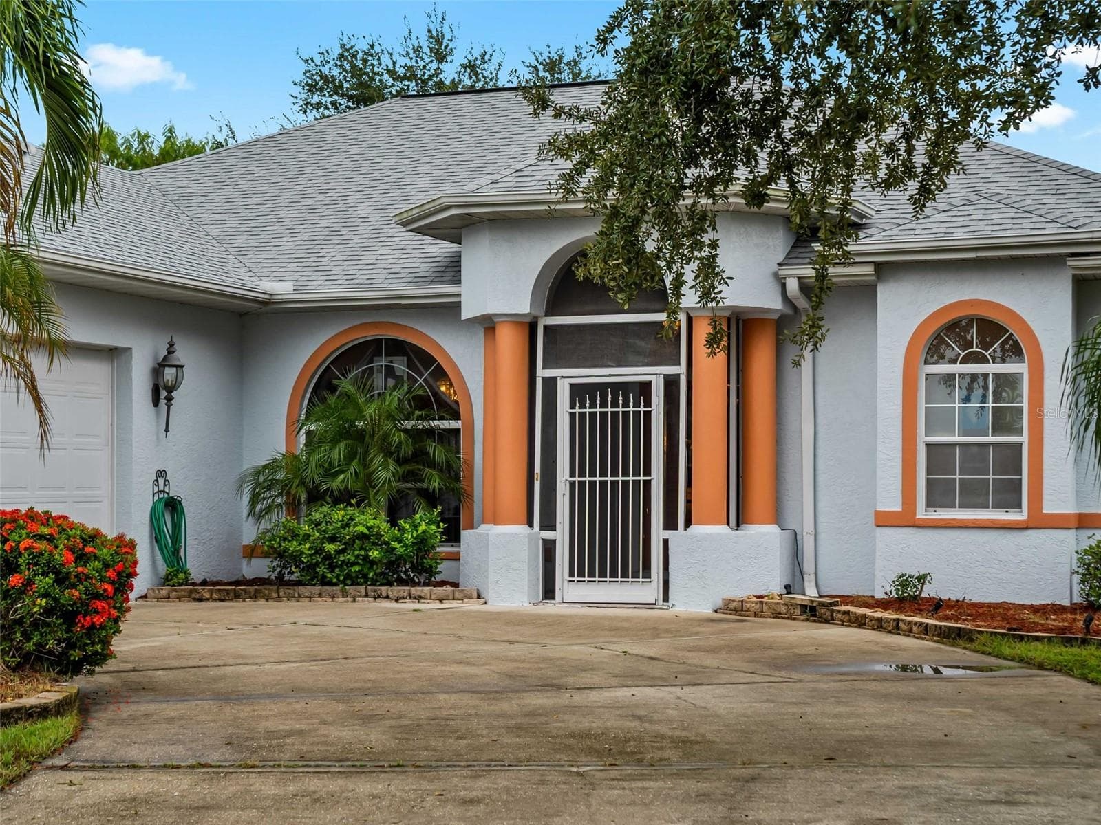FrontExterior_9336StPaulDr_PortCharlotte_ArchedEntry_Close.jpg - 9336 ST PAUL DR, PORT CHARLOTTE