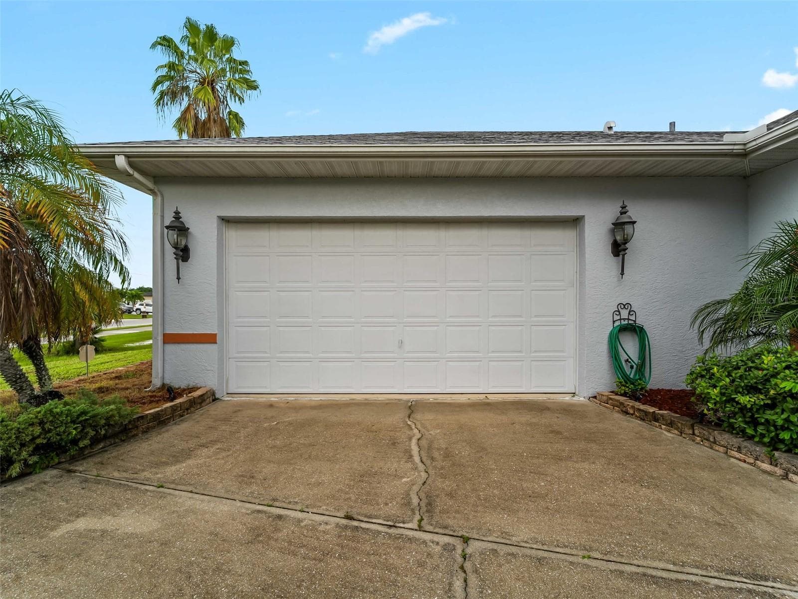 Garage_9336StPaulDr_PortCharlotte_Driveway_Wide.jpg - 9336 ST PAUL DR, PORT CHARLOTTE