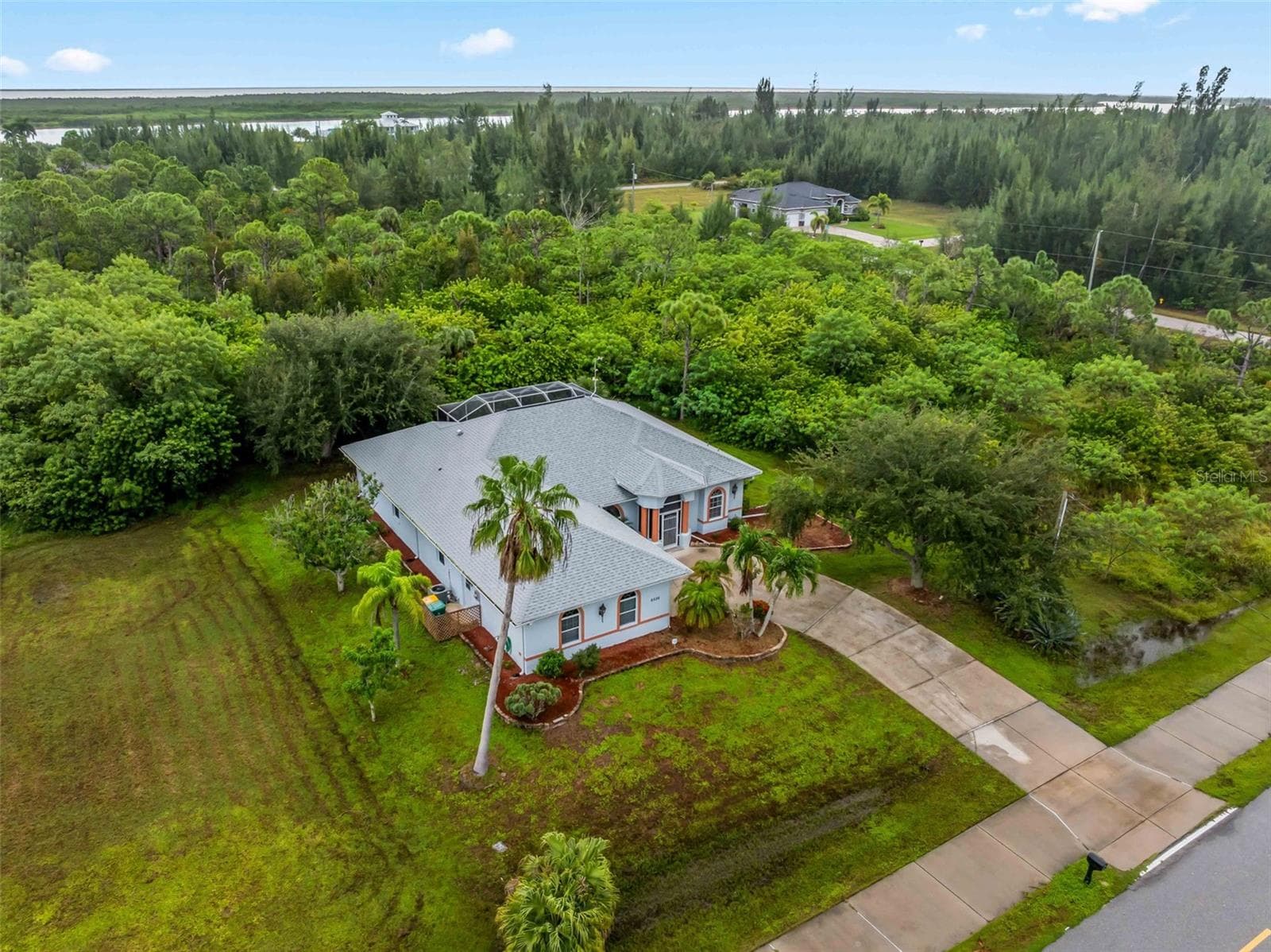 Aerial_9336StPaulDr_PortCharlotte_PrivateLot_Corner.jpg - 9336 ST PAUL DR, PORT CHARLOTTE