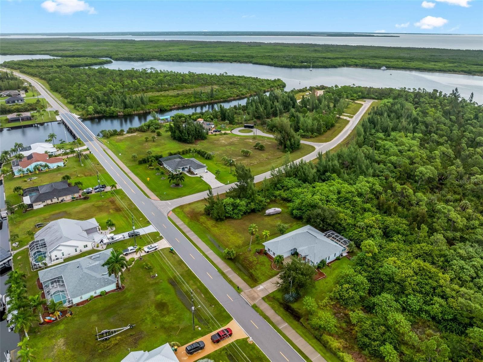 Aerial_9336StPaulDr_PortCharlotte_WaterProximity_Panorama.jpg - 9336 ST PAUL DR, PORT CHARLOTTE
