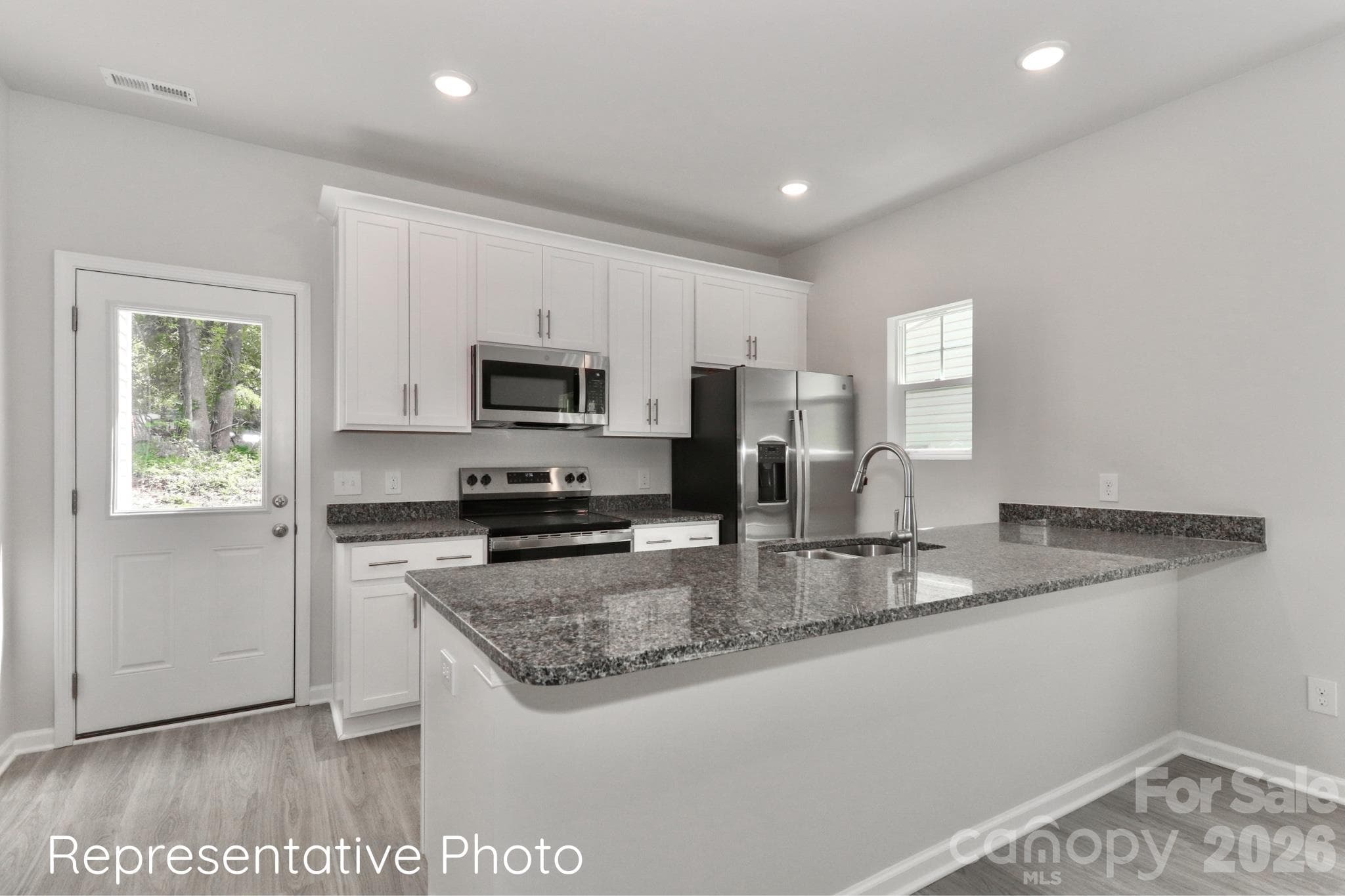 Counter tops will be white quartz. - 792 Hillard Street, Statesville