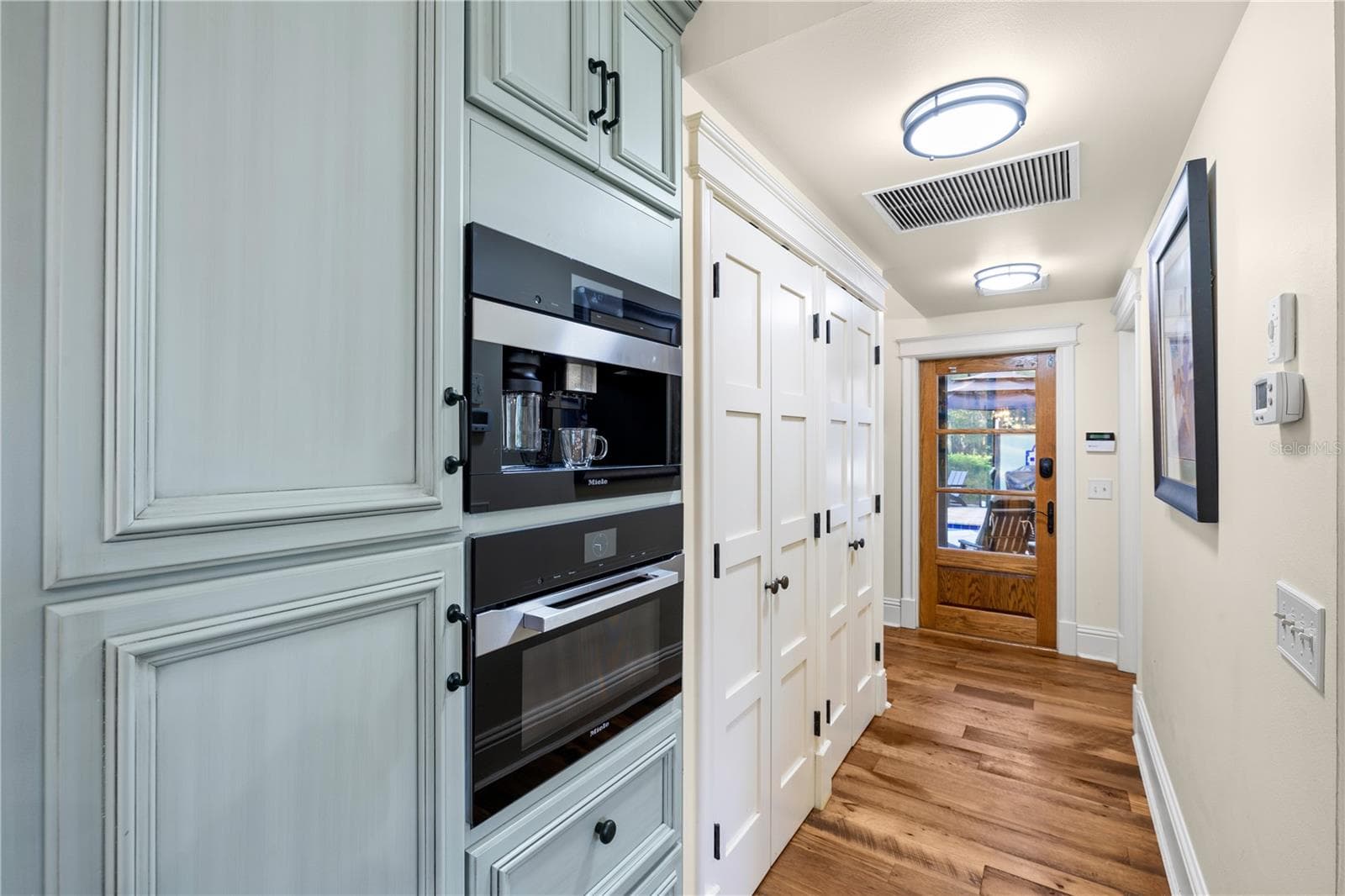 built-in Miele coffee/espresso system and speed oven - 5903 RIVER FOREST CIR, BRADENTON