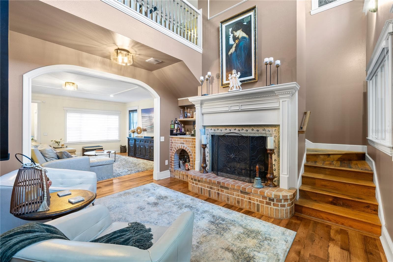 fireplace (with custom mosaic tile) sitting room - 5903 RIVER FOREST CIR, BRADENTON