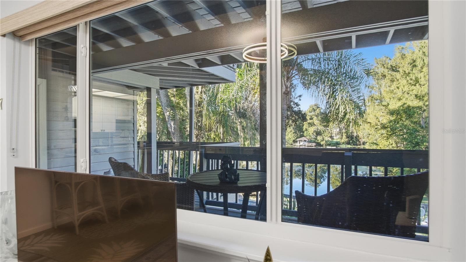 Water view looking from living room - 20820 RIVER DR #B25, DUNNELLON