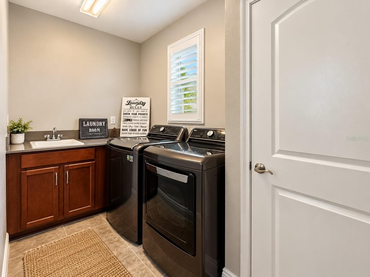 Laundry with sink and closet - 3120 CRISPIN CIR, ST CLOUD