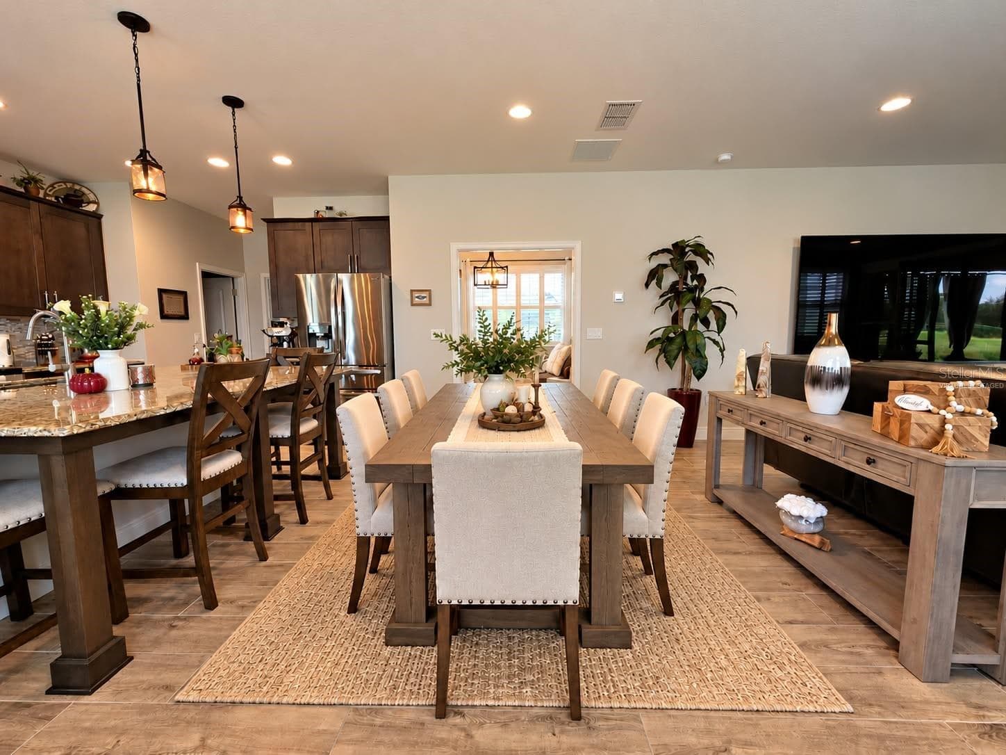 Open Plan- Dining Virtually Staged - 3120 CRISPIN CIR, ST CLOUD