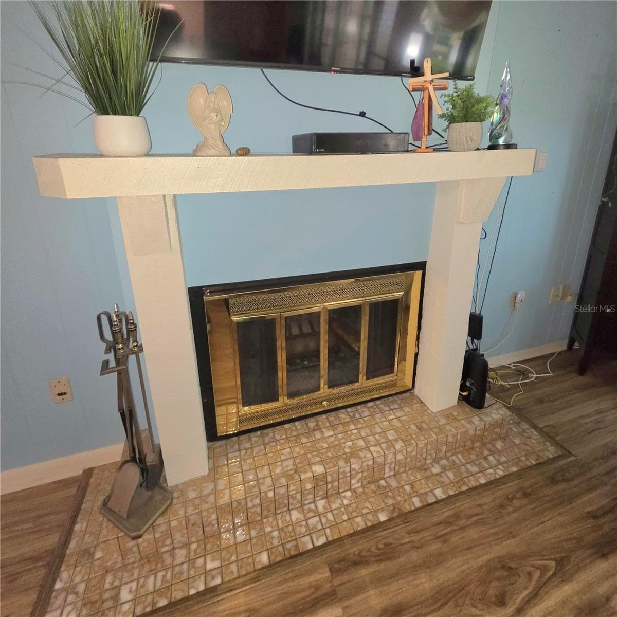 Fire place in family room - 2101 SUNSET POINT RD #2603, CLEARWATER