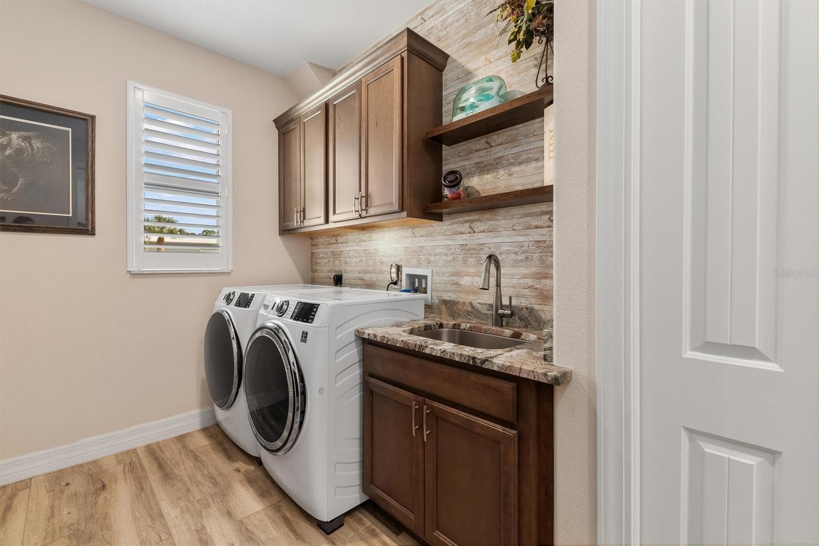 Laundry Room With Sink and Closet - 8414 DAFOE ST, PORT CHARLOTTE