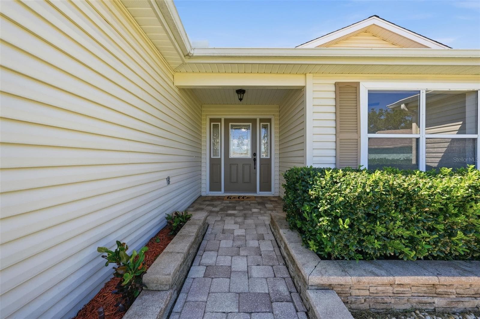 Beautiful paver walkway greeting you - 24809 RIVERBOAT BND, LEESBURG