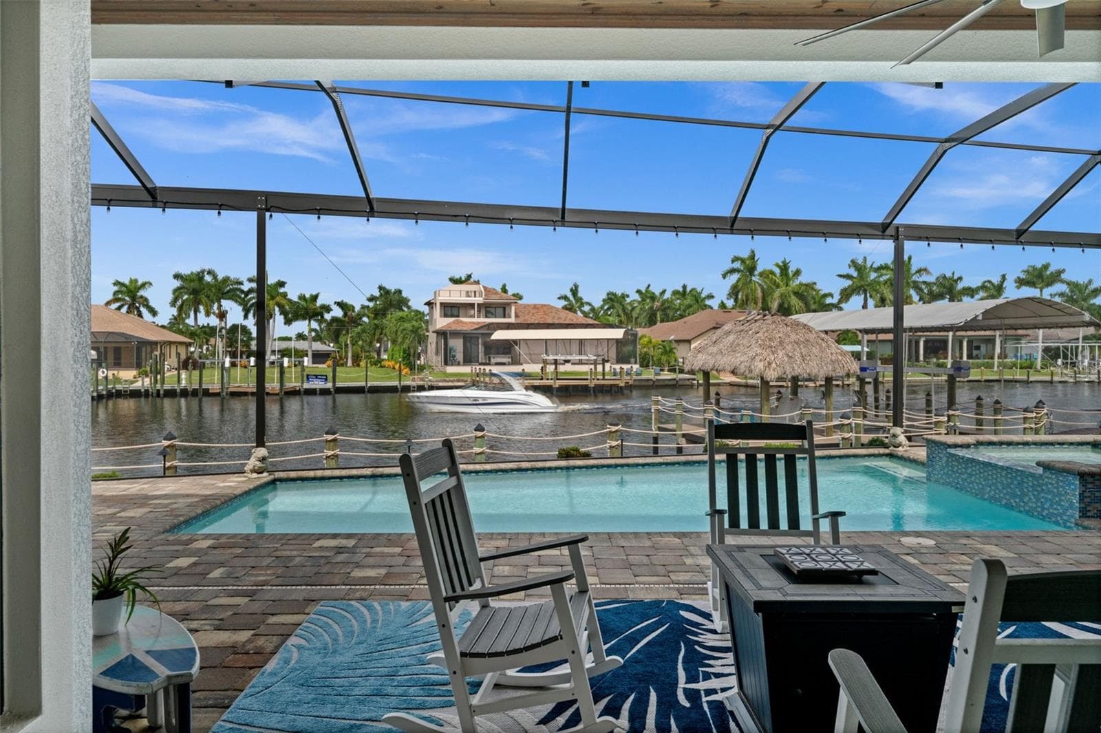 Watch the boats go by right from your lanai on the extra wide Bimini Canal - 5205 SUNSET CT, CAPE CORAL