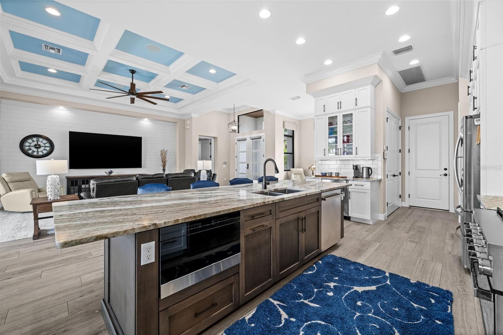 The island keeps the cook in the center of everything - 5205 SUNSET CT, CAPE CORAL