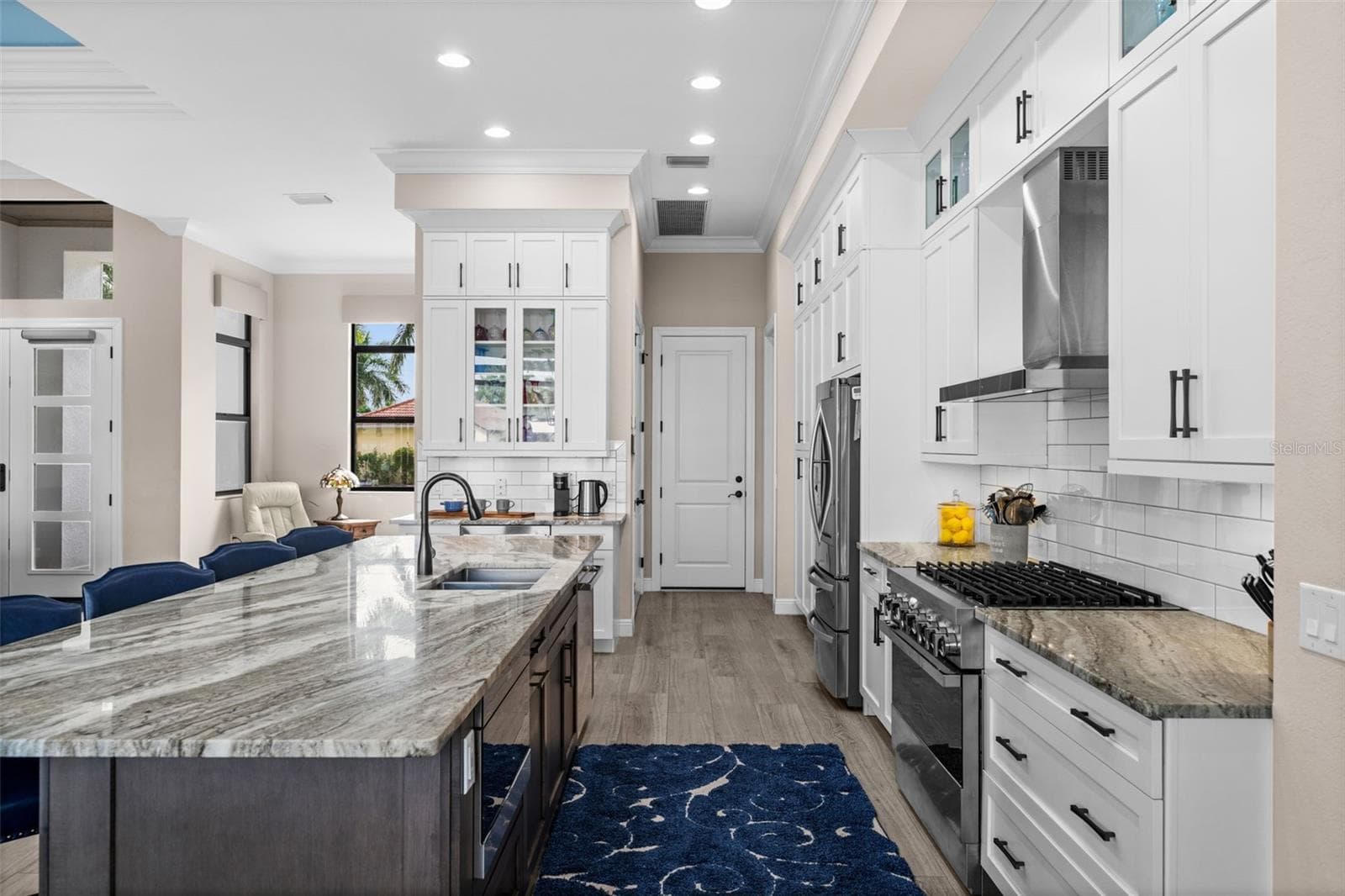 Granite tops and lots of cabinets in this well planned kitchen - 5205 SUNSET CT, CAPE CORAL