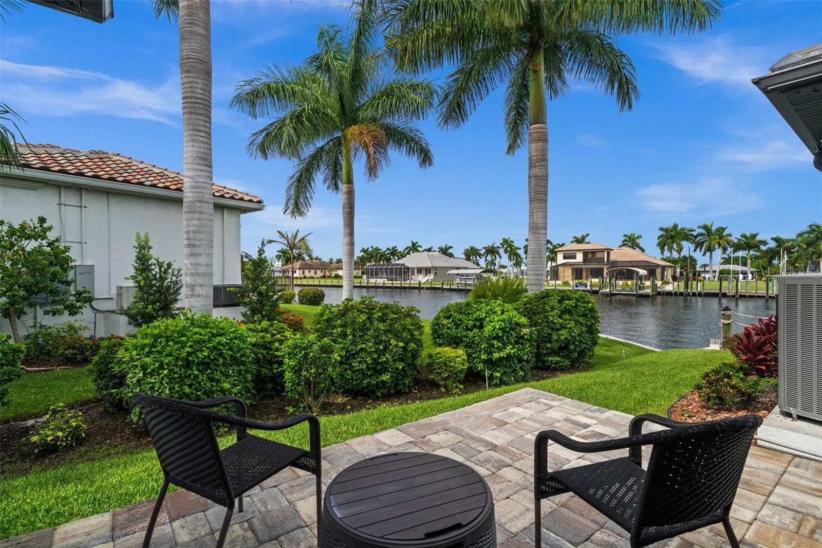 Views of the water from the 2nd bedroom / Junior Suite - 5205 SUNSET CT, CAPE CORAL