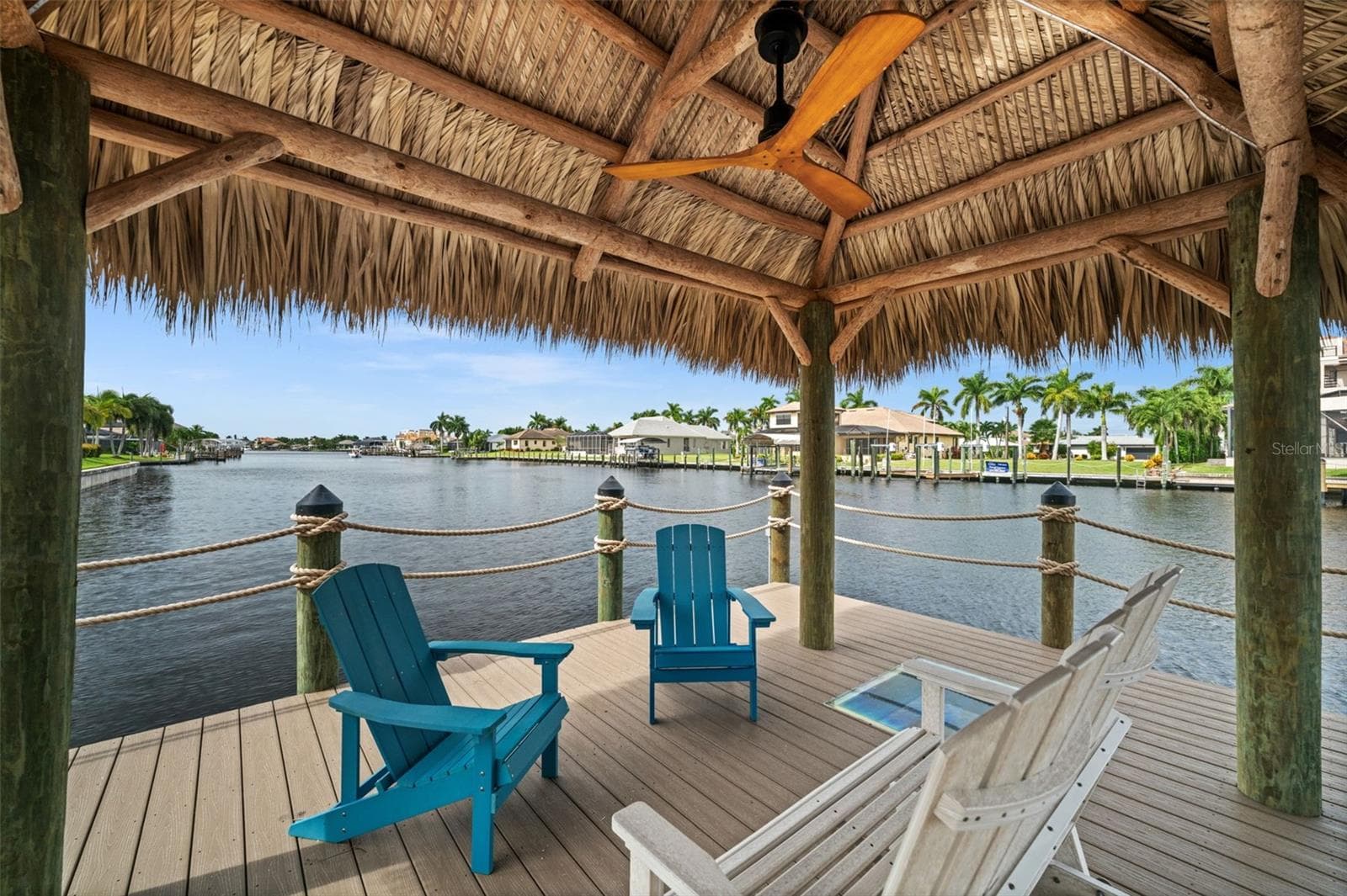 Tiki hut with ceiling fan - 5205 SUNSET CT, CAPE CORAL