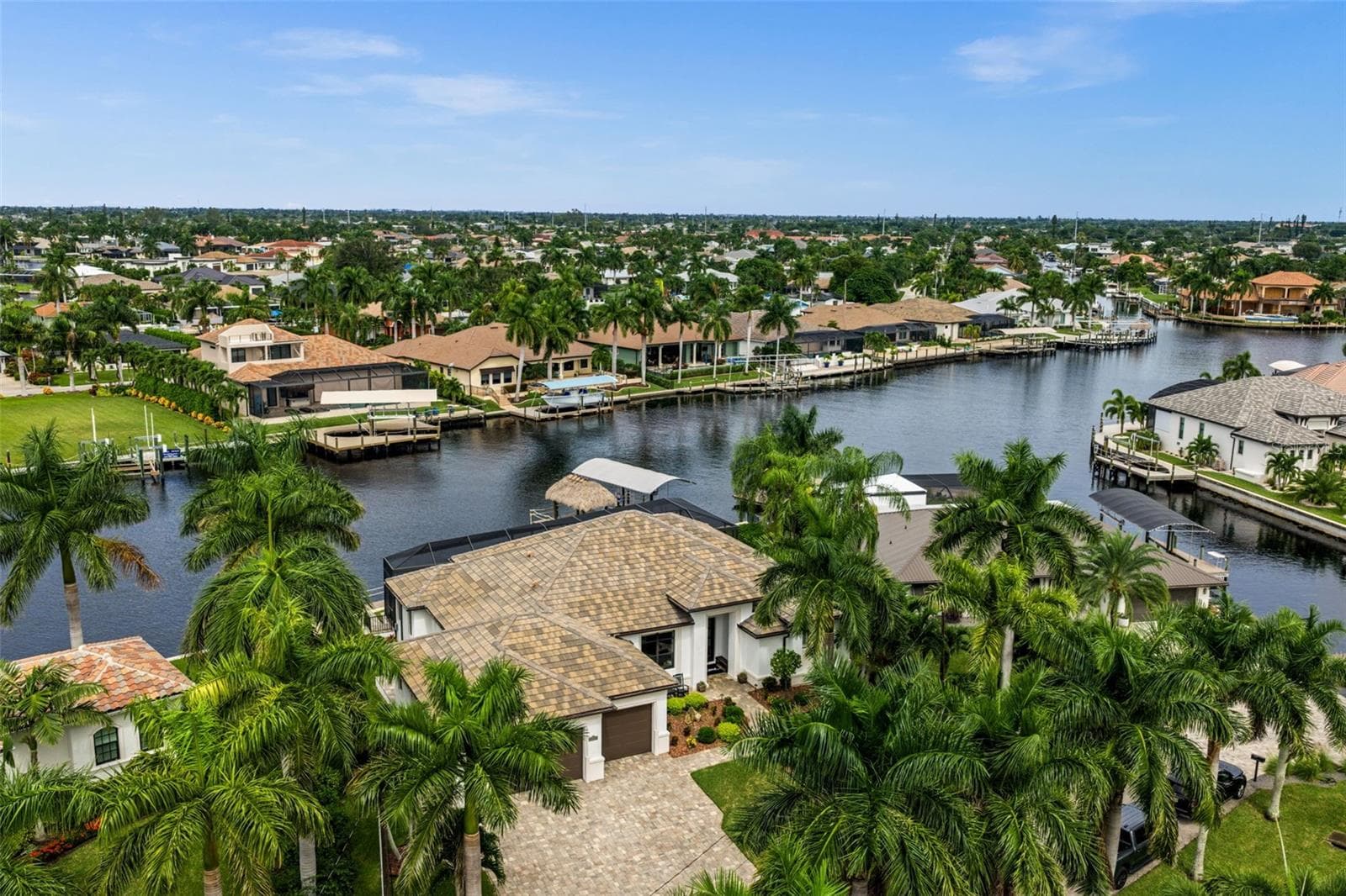 Beautiful setting on the 200' wide Bimini Canal - 5205 SUNSET CT, CAPE CORAL