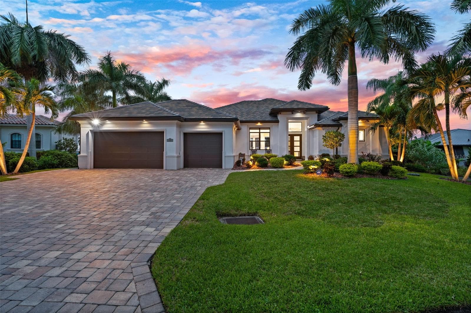 A gorgeous house in the evening - 5205 SUNSET CT, CAPE CORAL