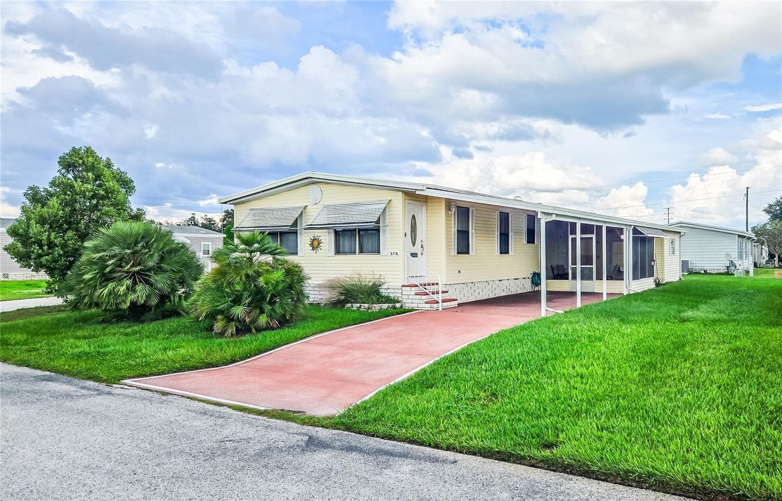 Manufactured Home at 5716 PAWNEE ST, ZEPHYRHILLS, photo 2 of 56