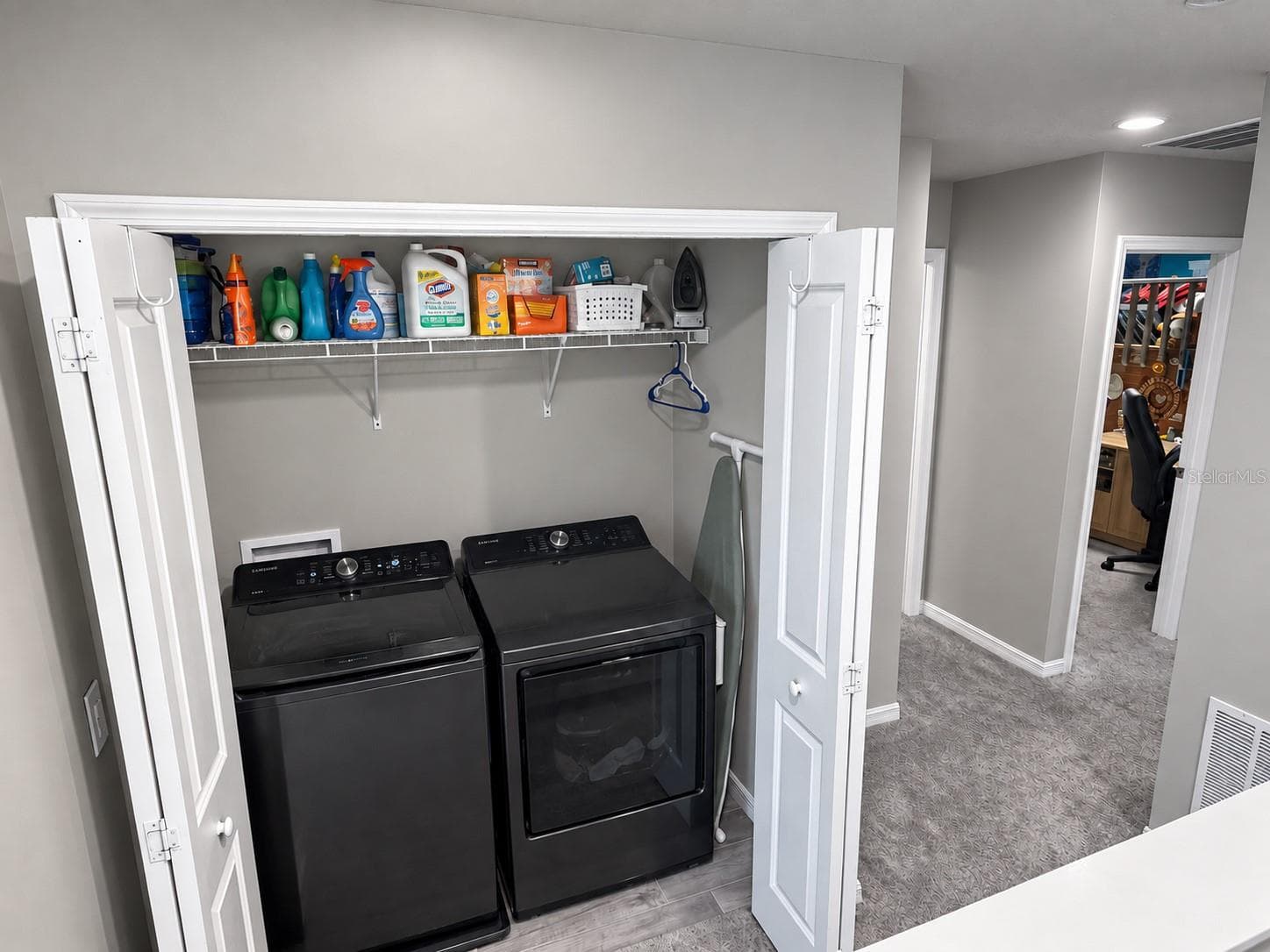 Inside and upstairs Laundry with washer and gas dryer hook up. - 11861 BLAMEY TRL, ODESSA