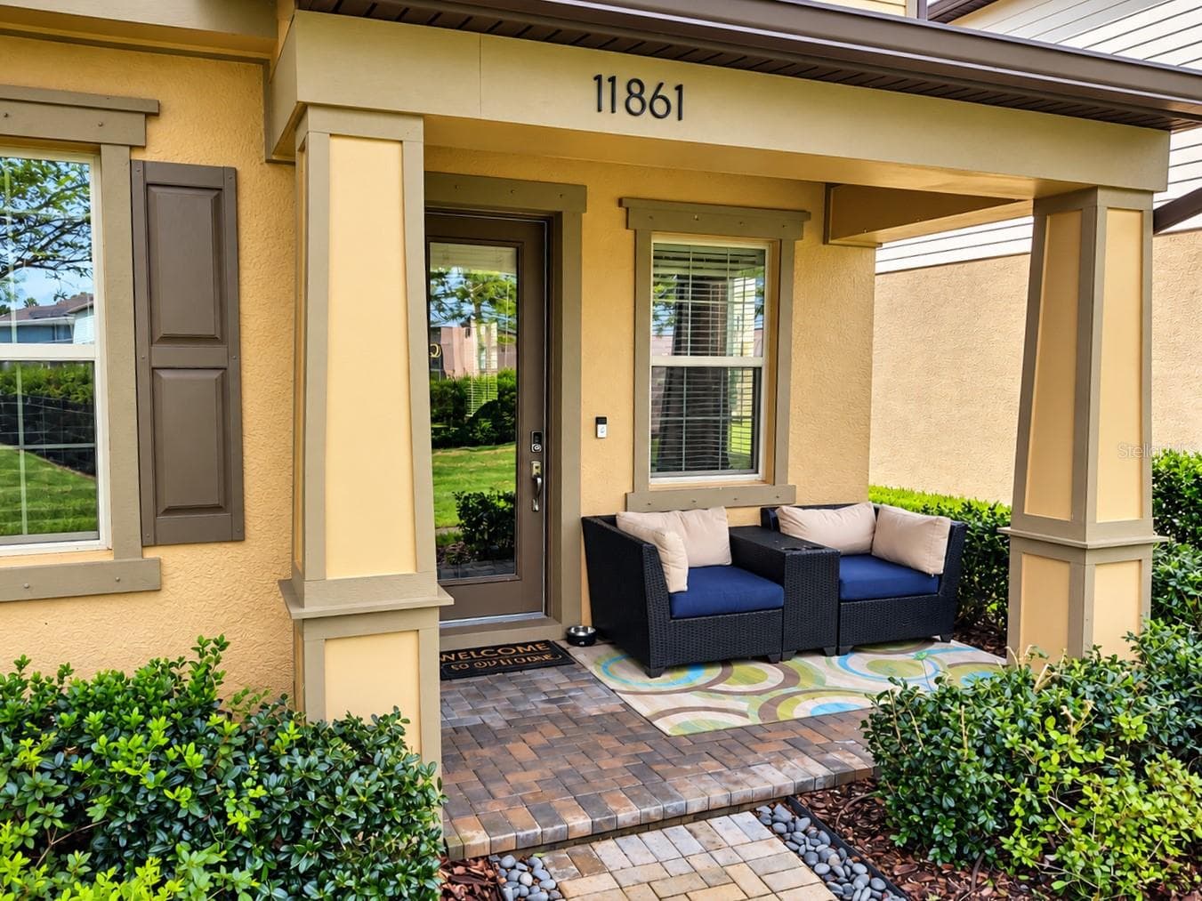 North facing, shady, and covered front porch - 11861 BLAMEY TRL, ODESSA