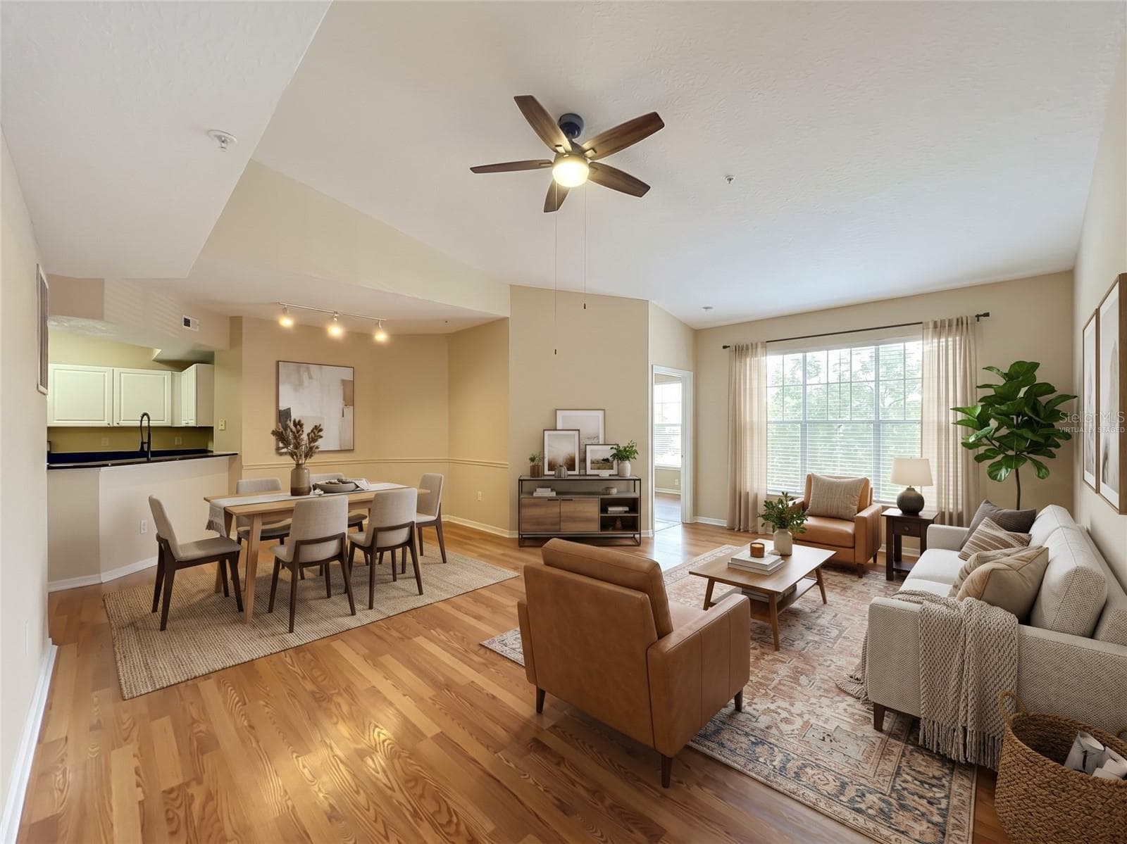 Virtually Staged Family Room - 5578 METROWEST BLVD #1-310, ORLANDO