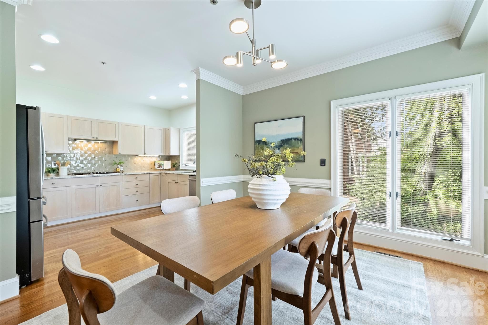 Entertain family and friends on holidays and special occasions in the Dining Room with modern chandelier. - 201 Hillside Avenue, Charlotte