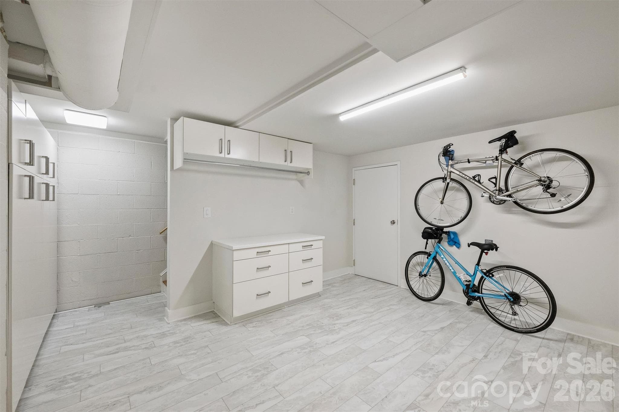 This lower level flex space would be perfect for an Office, Studio, or Workout Room. - 201 Hillside Avenue, Charlotte