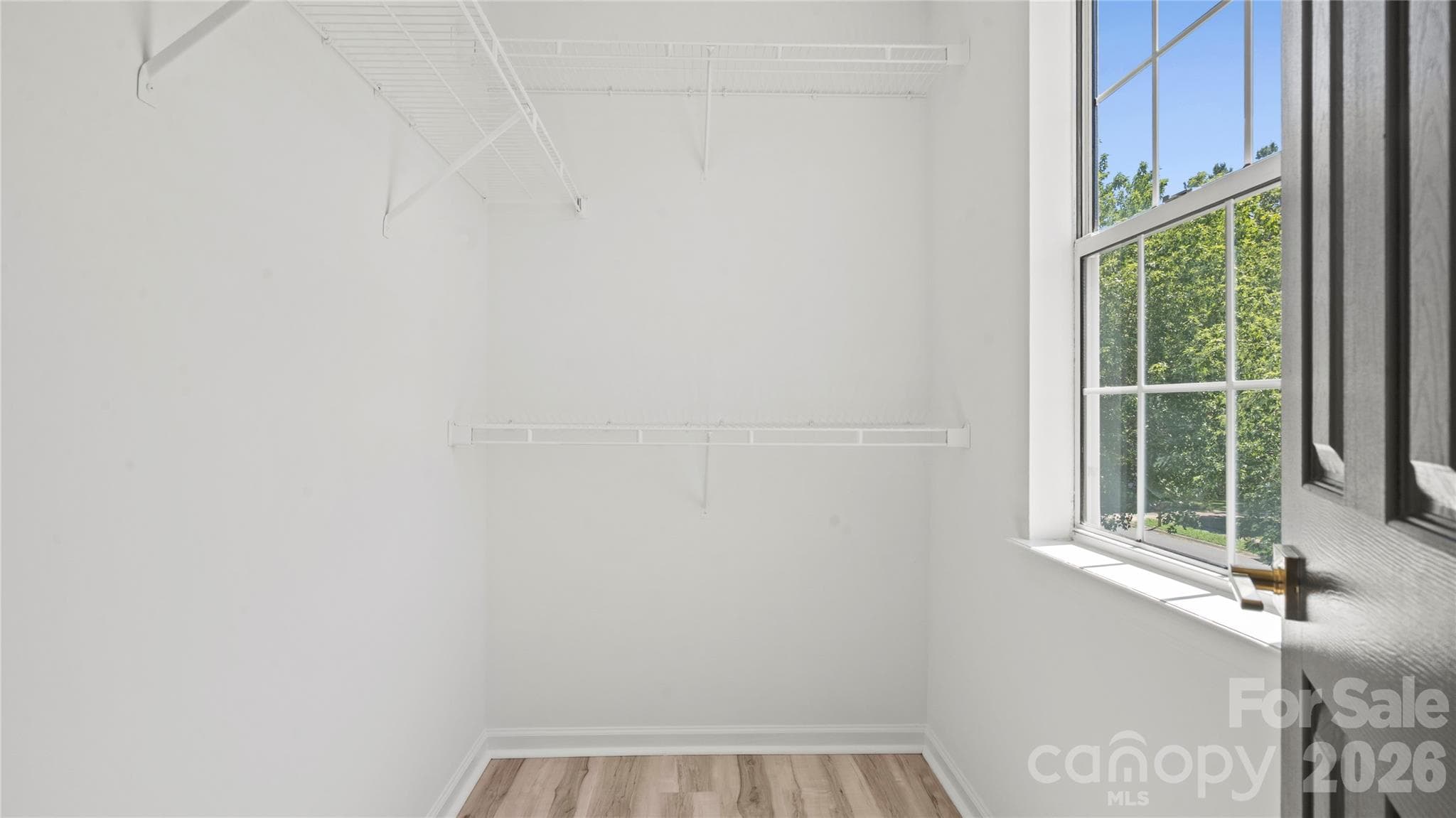 Primary Bedroom has a Walk In Closet and Second Linen Closet - 13918 Wild Heather Court, Charlotte