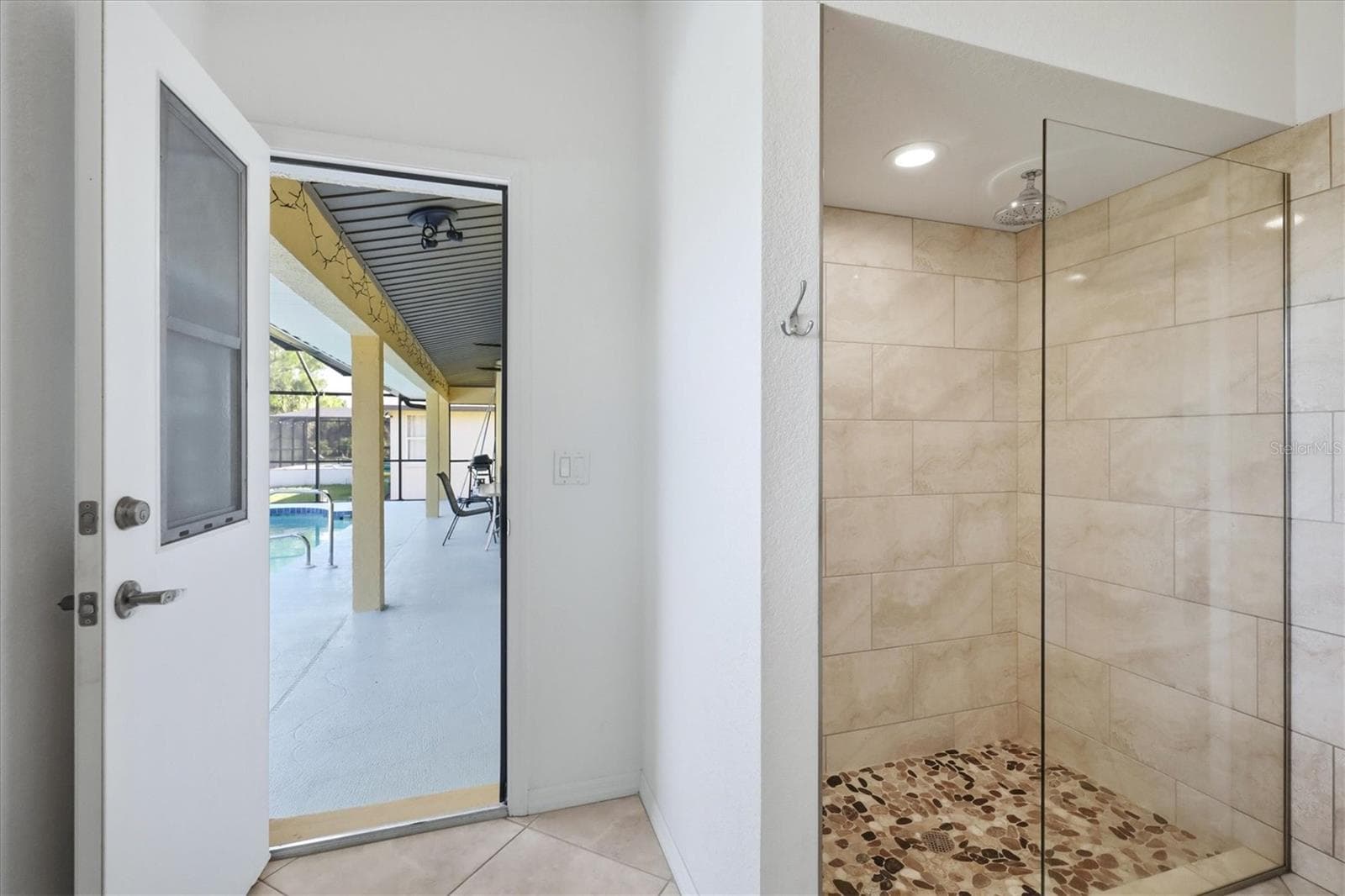 Guest Bath to Pool - 1078 ROTONDA CIR, ROTONDA WEST