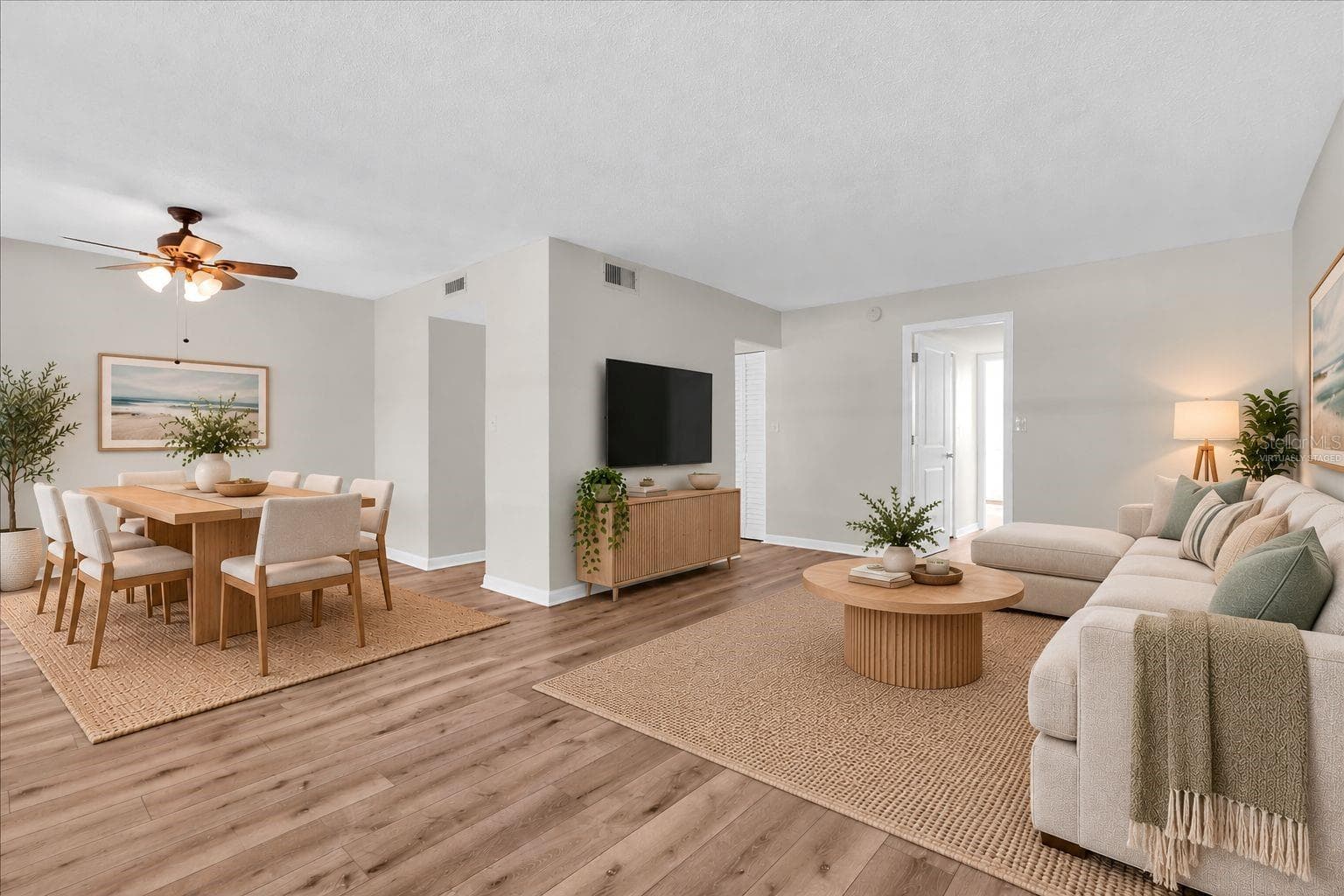 Virtually Staged: Open and Bright Living room/Dining Room - 4885 1ST ST NE #106, ST PETERSBURG