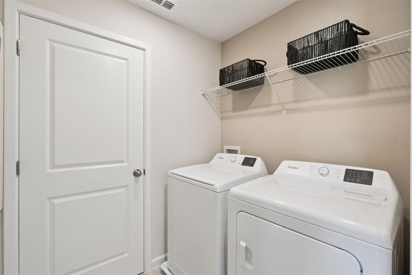 Lakeside at Satilla Zara Model Laundry Room - 5030 ORINOCO LN, ST CLOUD