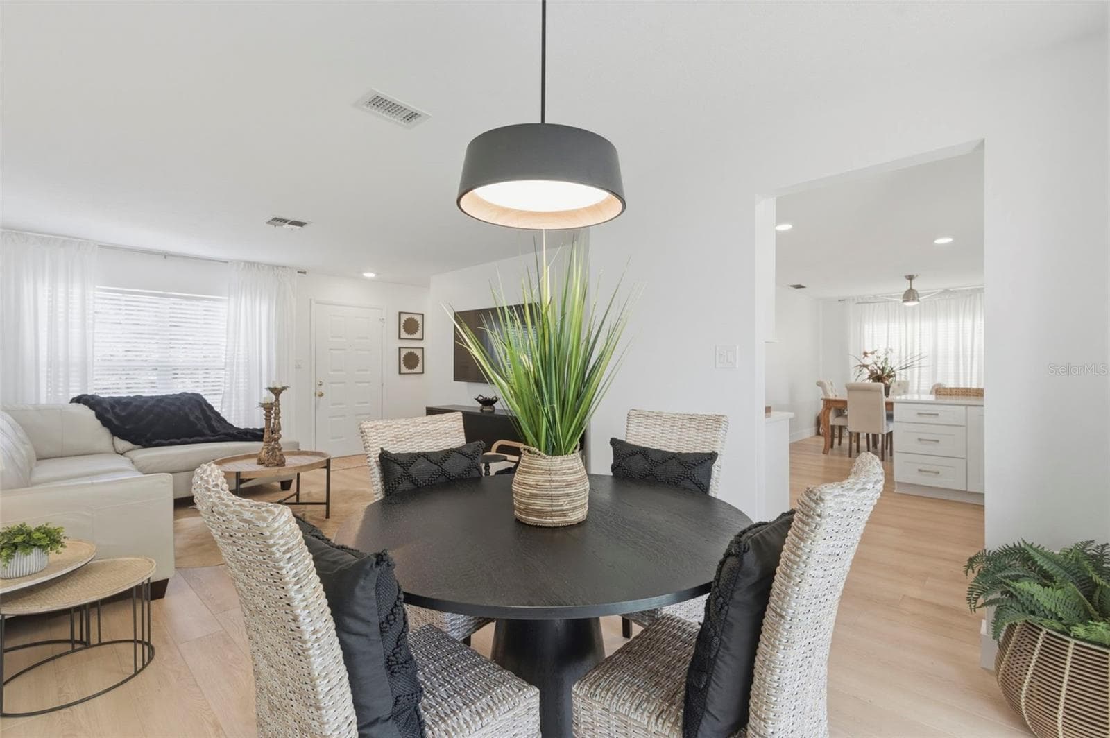 Living Room- Dining combo. No Popcorn anywhere, New Luxury Vinyl throughout! - 4642 SAINT LAWRENCE DR, NEW PORT RICHEY