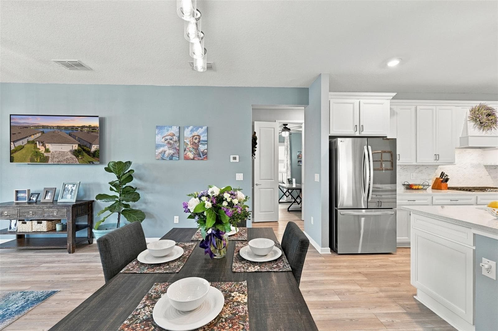 Dining Space in the Open Floor Plan.. Table for four included! - 9260 BALLASTER POINTE LOOP, PARRISH