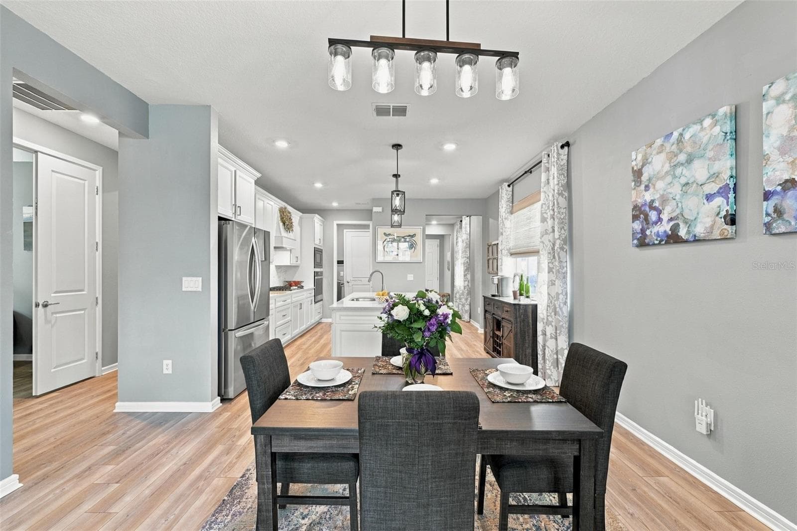 Hallway to the 2nd and 3rd bedrooms and full bathroom. - 9260 BALLASTER POINTE LOOP, PARRISH