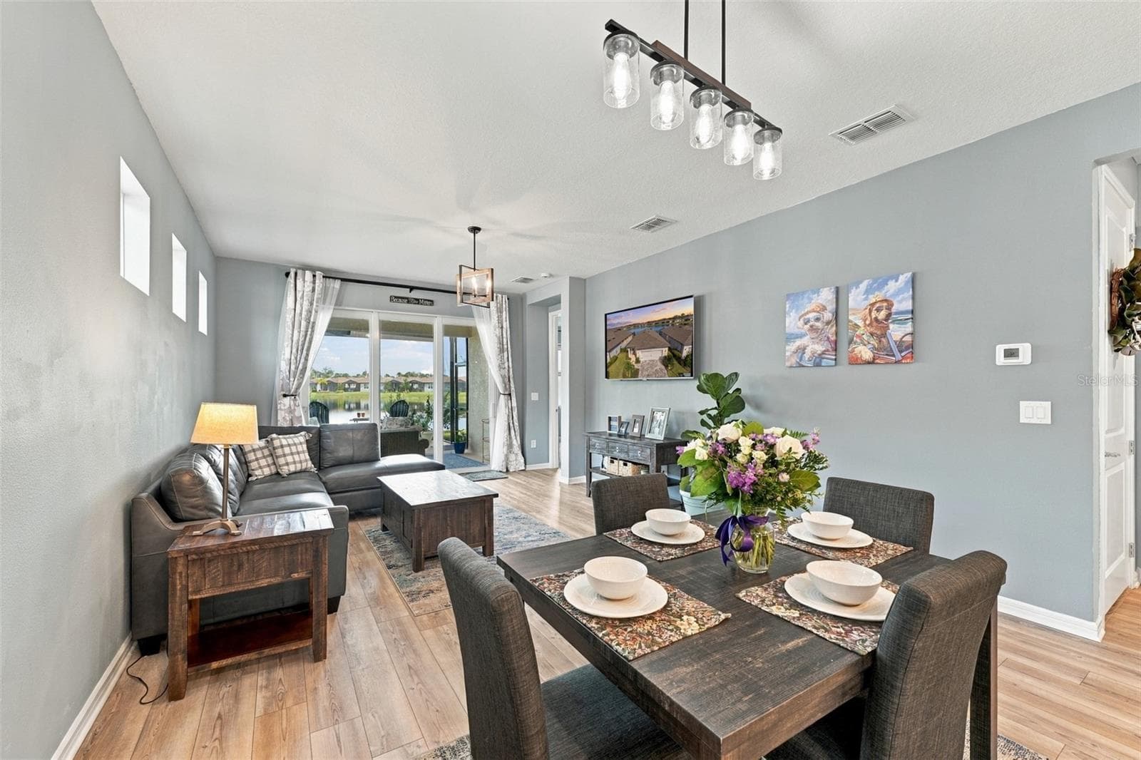 Spacious open concept includes many furnishings. - 9260 BALLASTER POINTE LOOP, PARRISH
