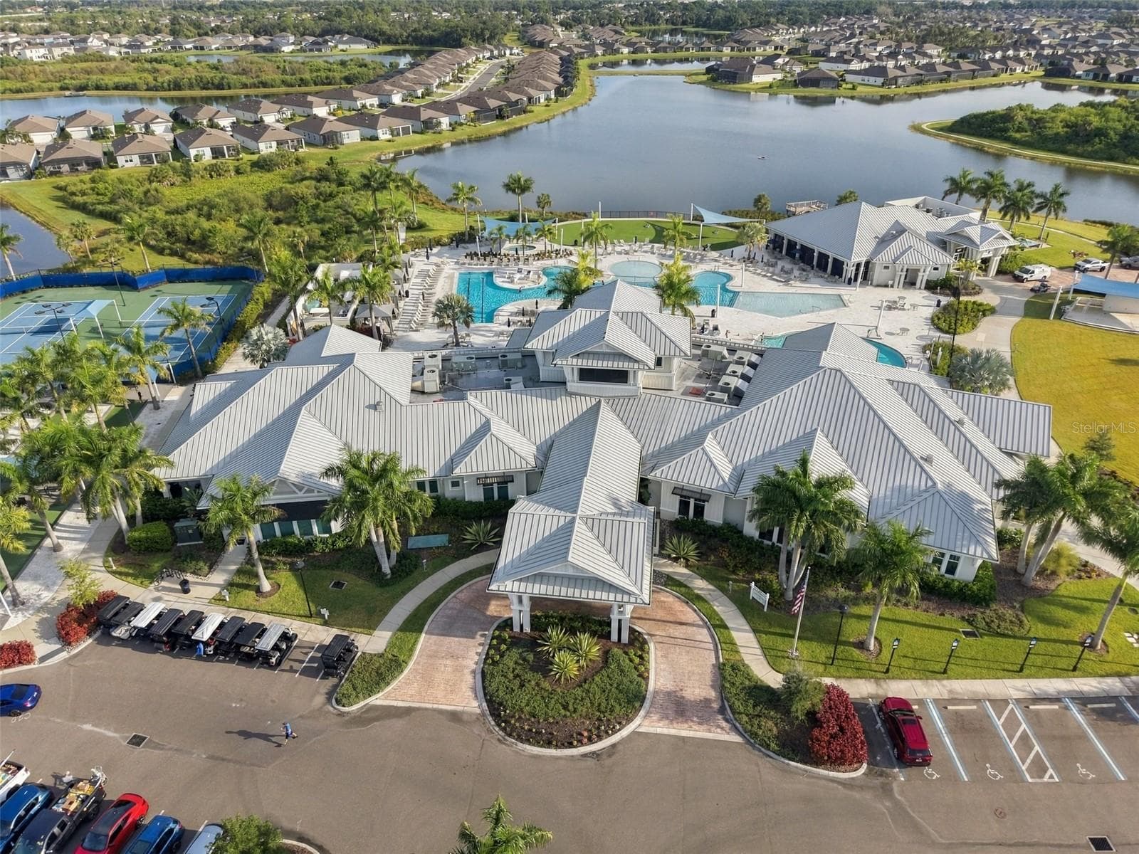 The Luxury Club house complete with party rooms, full size gym, exercise studio, gorgeous pool deck with spa, fire pit, pool table and comforable seating througout! - 9260 BALLASTER POINTE LOOP, PARRISH