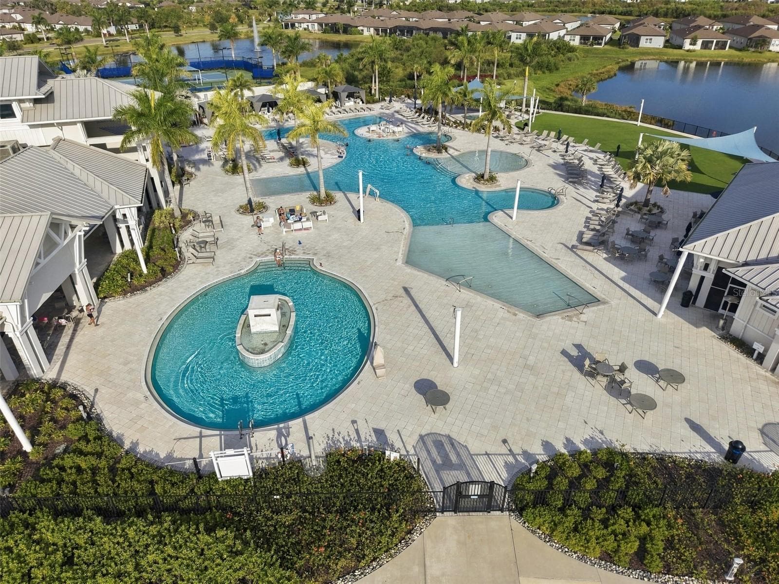 Multiple pools, sun shelf, covered cabanas add to this Luxury Adult Lifestyle. - 9260 BALLASTER POINTE LOOP, PARRISH