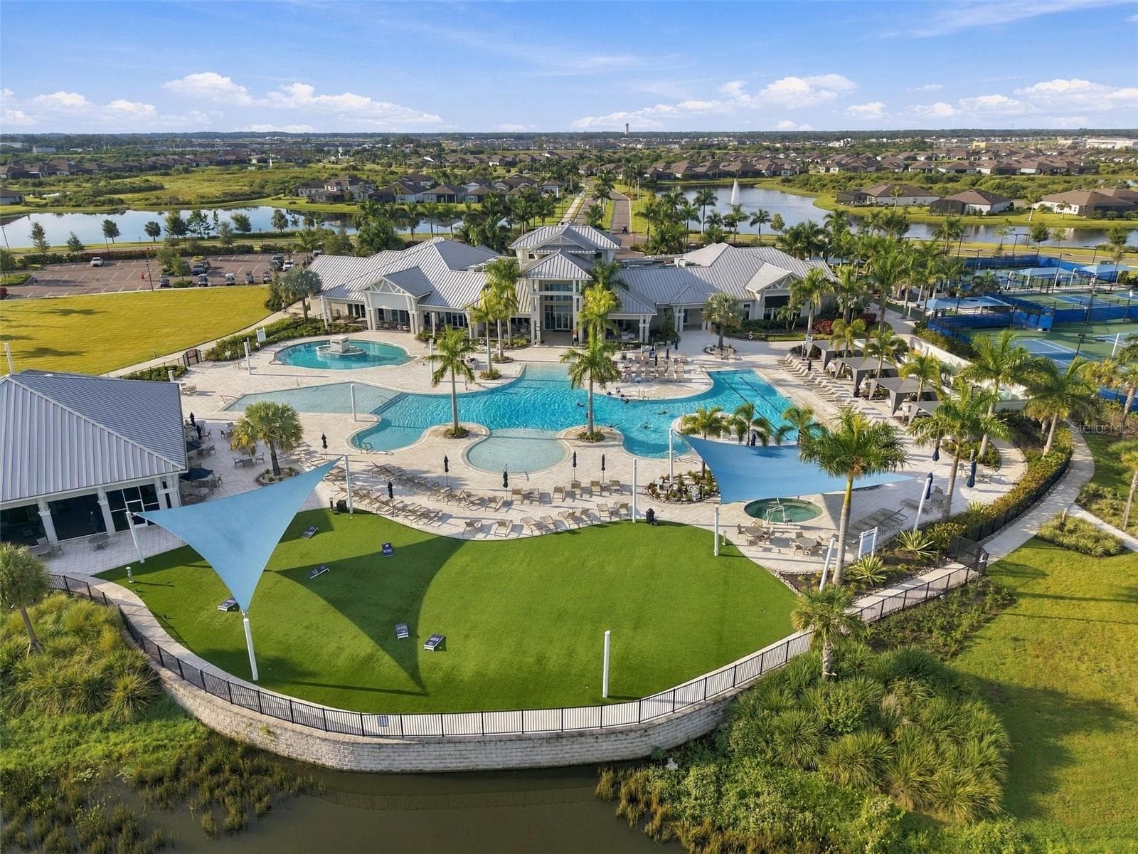 Del Webbs incredible amentities include this Game Green, Hot Tub, Amzing Pool Deck and Club House. - 9260 BALLASTER POINTE LOOP, PARRISH