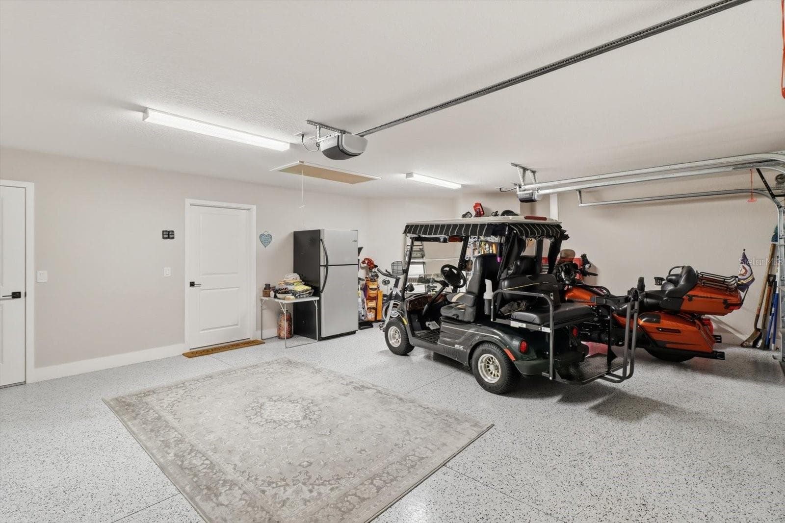 garage - 7528 DANIEL COLLINS CT, THE VILLAGES