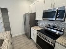Villa at 1602 CUMIN DR, POINCIANA, photo 5 of 14