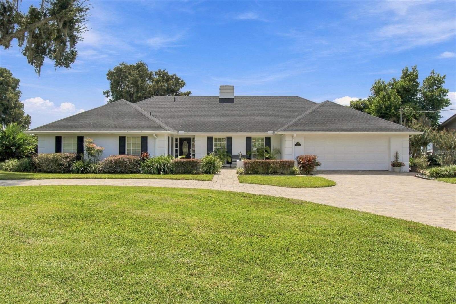 Front exterior - new roof - 1921 MANOR CIR SE, WINTER HAVEN