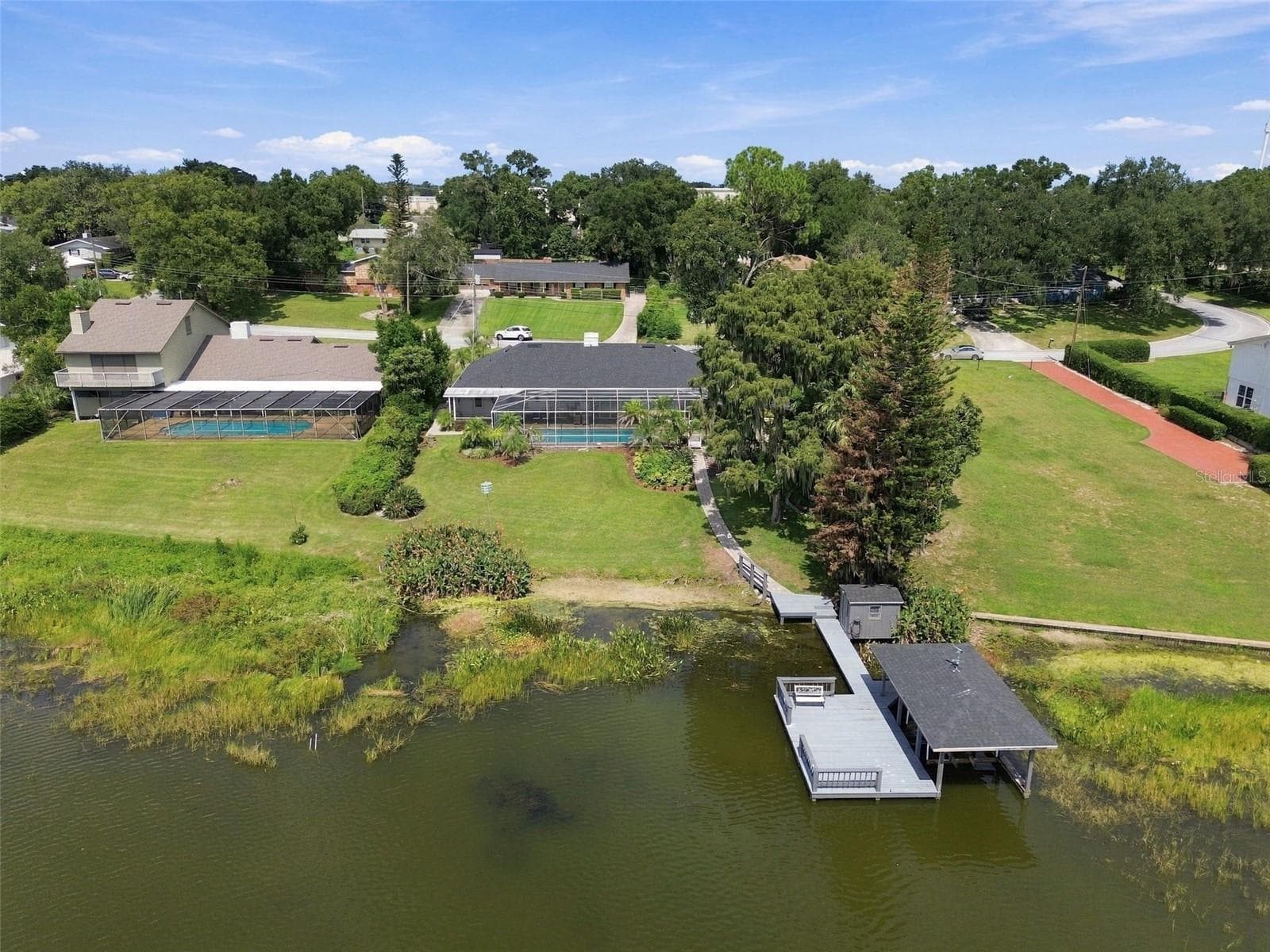 Dock & boathouse with lift - 1921 MANOR CIR SE, WINTER HAVEN