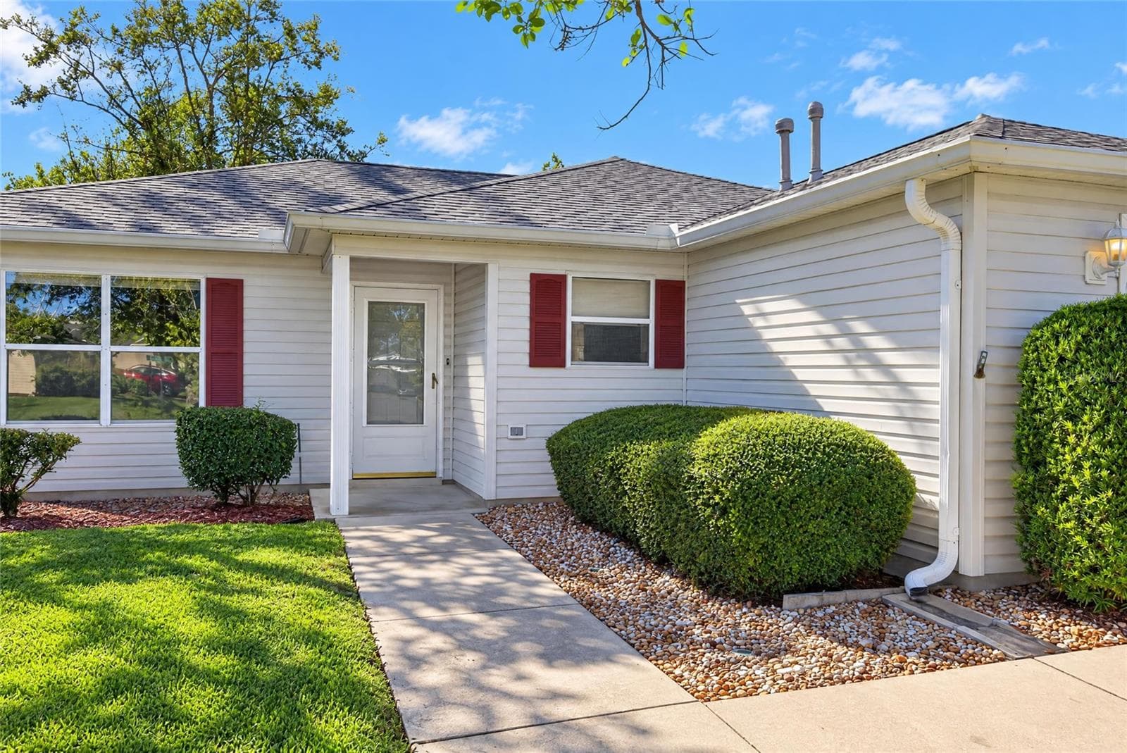 Gutters & Downspouts & Covered front Porch - 17900 SE 92ND AMORY AVE, THE VILLAGES