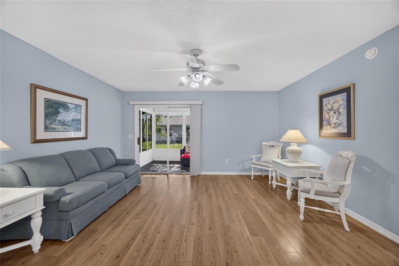 Living Room with Laminate Flooring - 17900 SE 92ND AMORY AVE, THE VILLAGES