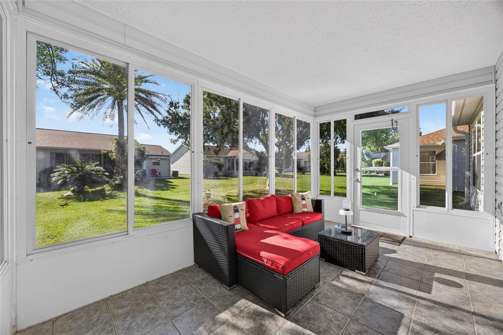 Tile Flooring in Enclosed Lanai - 17900 SE 92ND AMORY AVE, THE VILLAGES