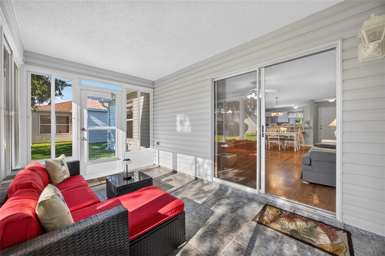 Enclosed Lanai & Slider to Living Room - 17900 SE 92ND AMORY AVE, THE VILLAGES
