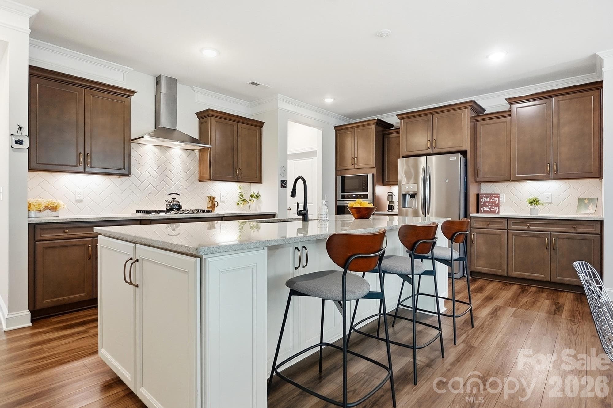 Stainless steel appliances including oven hood and gas stove - 2014 Old Evergreen Parkway, Indian Trail