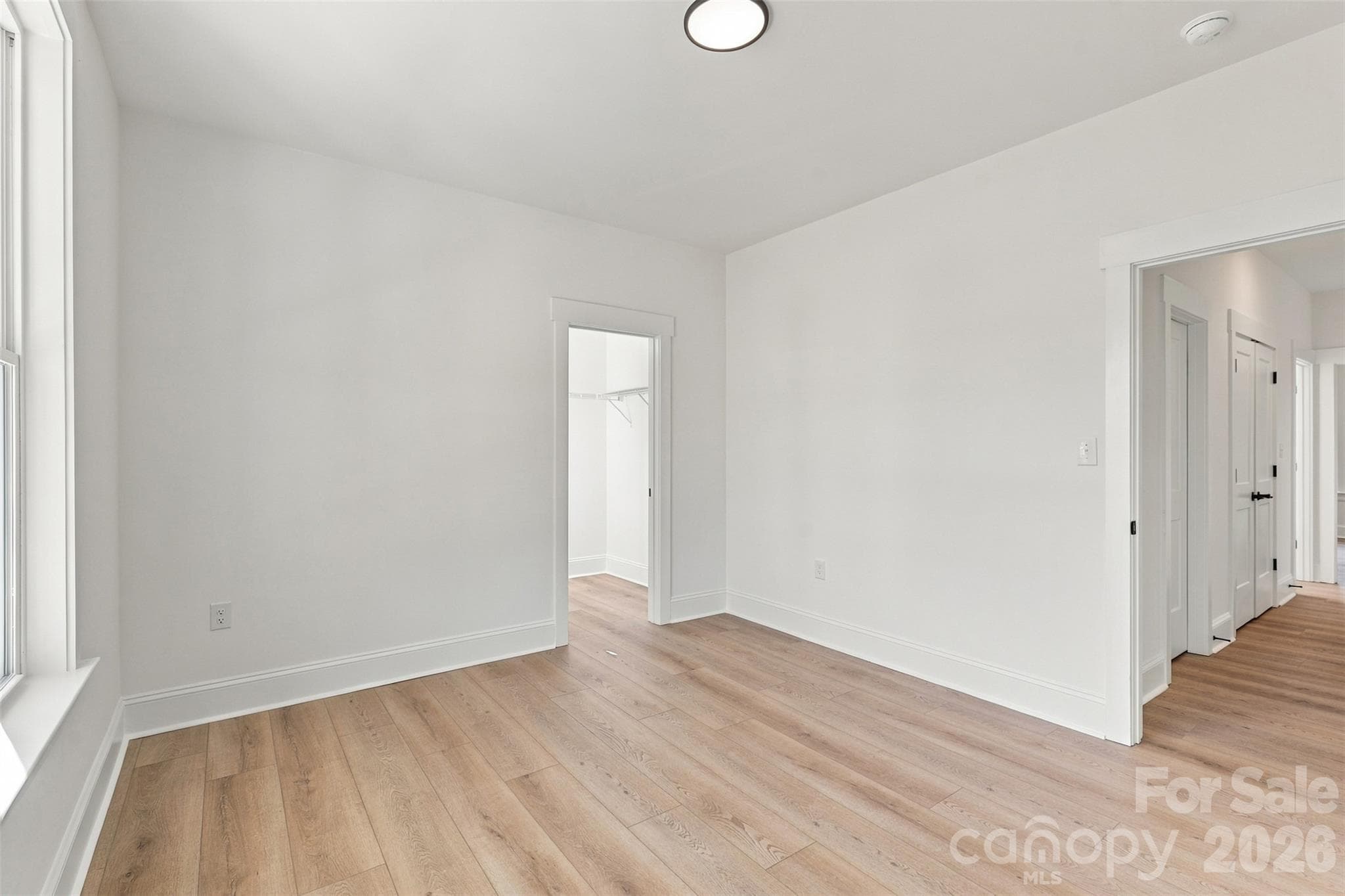 Bedroom 1- Secondary bedrooms all have a WIC! - 394 S NC 200 Highway, Stanfield