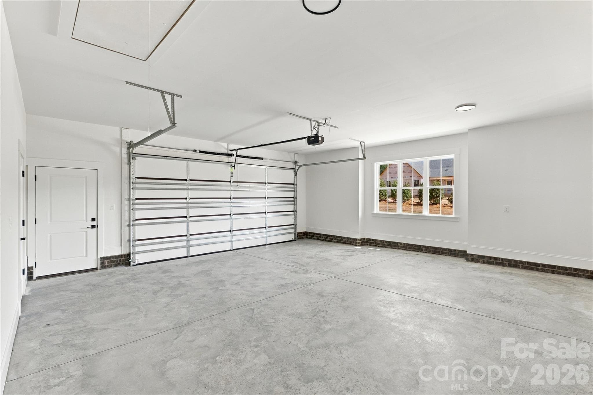 Large 2 car sideload garage w/ utility closet! - 394 S NC 200 Highway, Stanfield